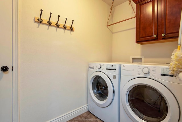 645 Galileo Dr, Nixa, MO 65714 - washroom featuring cabinet space, independent washer and dryer, and tile patterned floors
