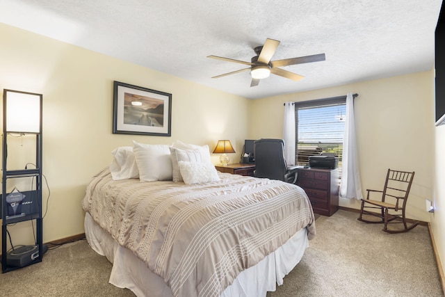 14410 Native Dr, Phillipsburg, MO 65722 - carpeted bedroom featuring ceiling fan and a textured ceiling