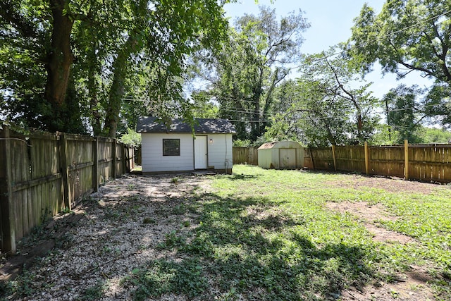 2716 W Elm St, Springfield, MO 65802 - fenced backyard featuring a storage shed