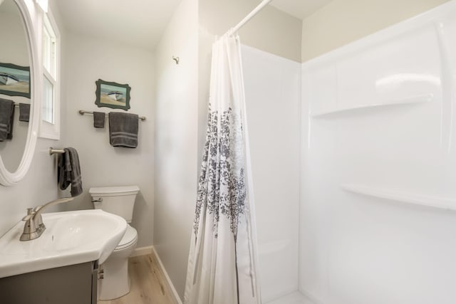 2616 Schupbach Rd, Clever, MO 65631 - full bathroom featuring vanity, wood finished floors, and curtained shower