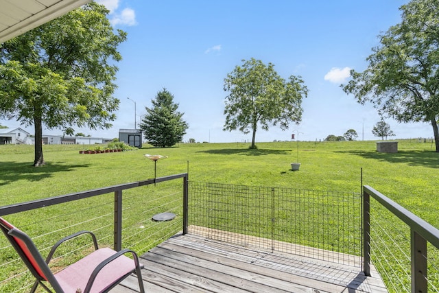 2616 Schupbach Rd, Clever, MO 65631 - wooden deck featuring a lawn and a storage unit
