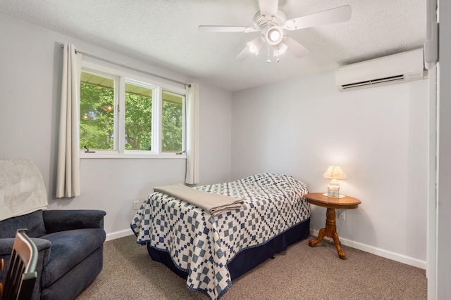 2616 Schupbach Rd, Clever, MO 65631 - bedroom with a wall mounted AC, carpet flooring, a textured ceiling, and ceiling fan