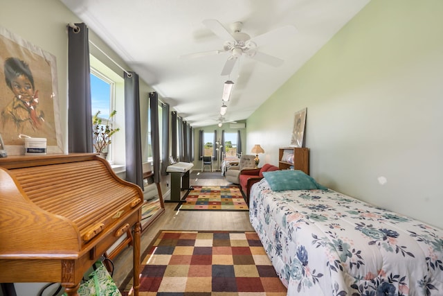 2616 Schupbach Rd, Clever, MO 65631 - bedroom featuring wood finished floors, lofted ceiling, and ceiling fan