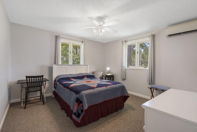 2616 Schupbach Rd, Clever, MO 65631 - carpeted bedroom featuring a wall mounted air conditioner, a textured ceiling, and ceiling fan