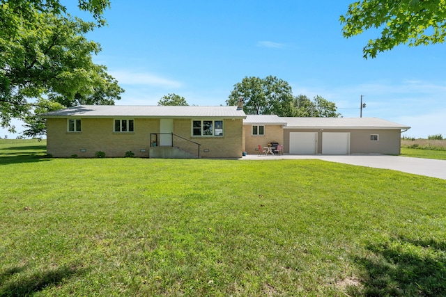 2616 Schupbach Rd, Clever, MO 65631 - ranch-style house featuring driveway, a garage, a front lawn, a metal roof, and a chimney