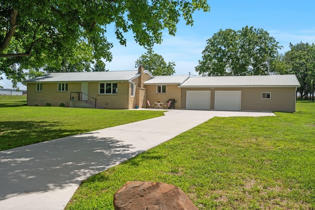 2616 Schupbach Rd, Clever, MO 65631 - ranch-style house featuring a garage, concrete driveway, a front lawn, and a metal roof
