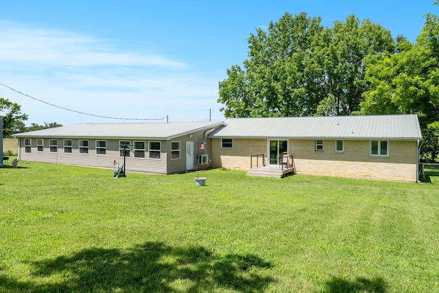2616 Schupbach Rd, Clever, MO 65631 - back of house featuring a lawn, brick siding, a metal roof, and crawl space