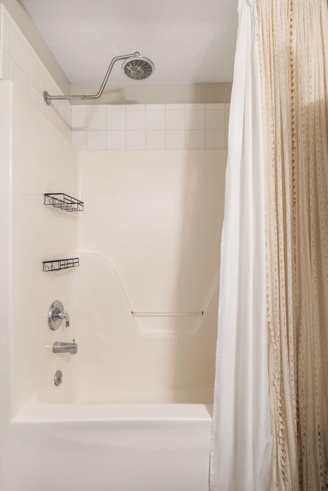578 Stoney Path, Nixa, MO 65714 - bathroom featuring shower / tub combo with curtain