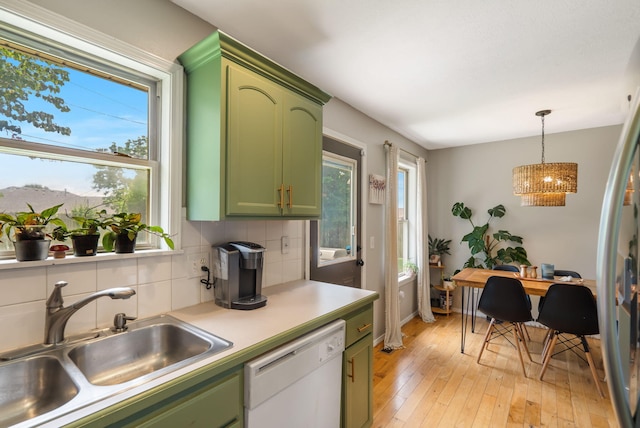 578 Stoney Path, Nixa, MO 65714 - kitchen with green cabinets, dishwasher, light wood-style flooring, and a chandelier
