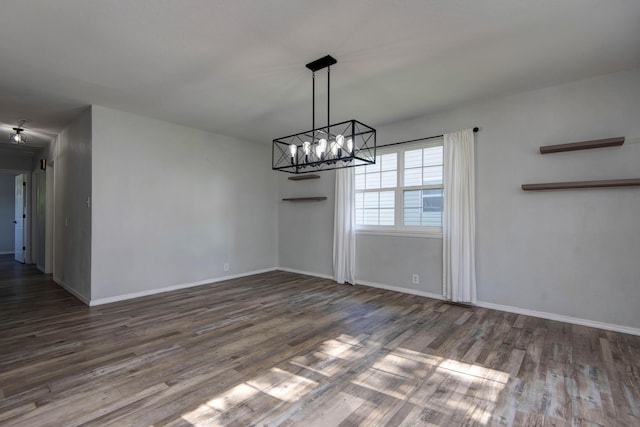 2525 New Hampshire Ave, Joplin, MO 64804 - unfurnished dining area with a chandelier and wood finished floors