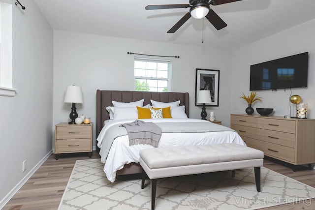 2525 New Hampshire Ave, Joplin, MO 64804 - bedroom with light wood-style flooring and ceiling fan