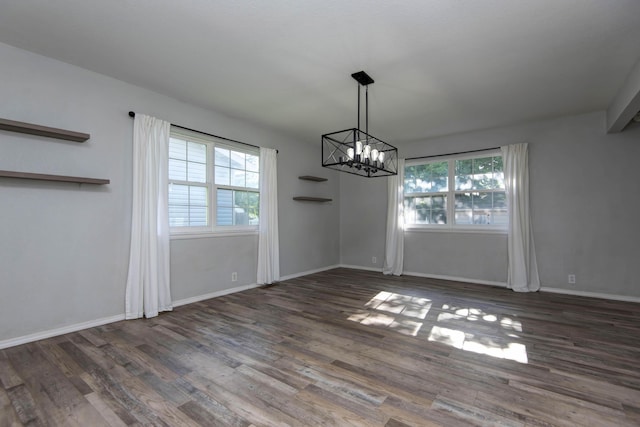 2525 New Hampshire Ave, Joplin, MO 64804 - unfurnished dining area with plenty of natural light, a chandelier, and wood finished floors