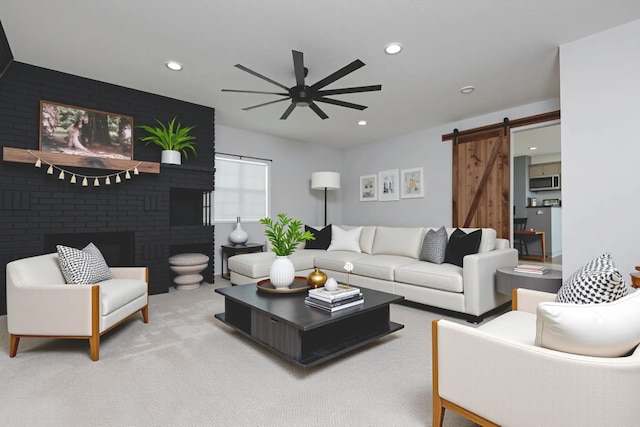 2525 New Hampshire Ave, Joplin, MO 64804 - living area featuring a barn door, a ceiling fan, and recessed lighting