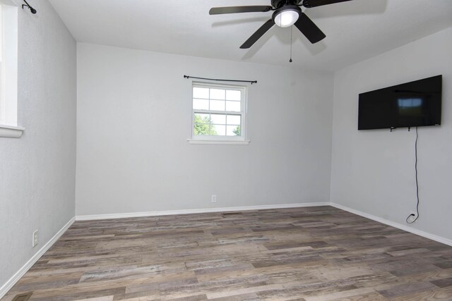 2525 New Hampshire Ave, Joplin, MO 64804 - empty room with wood finished floors and a ceiling fan
