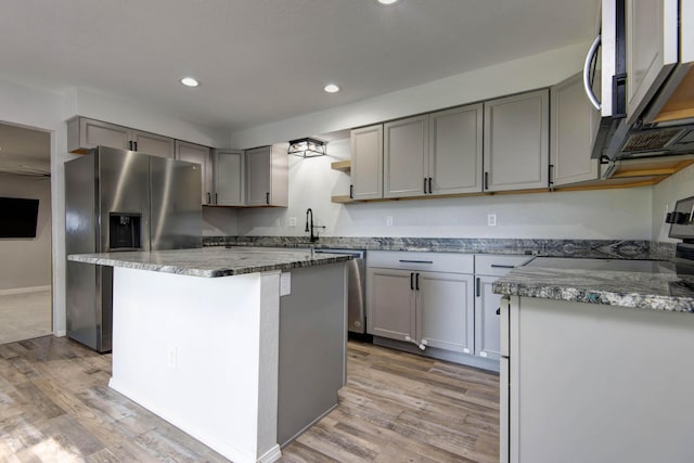 2525 New Hampshire Ave, Joplin, MO 64804 - kitchen with gray cabinetry, stainless steel appliances, recessed lighting, light wood-style flooring, and open shelves