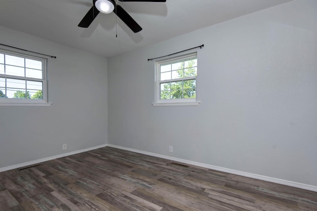 2525 New Hampshire Ave, Joplin, MO 64804 - unfurnished room featuring dark wood-style flooring and a ceiling fan