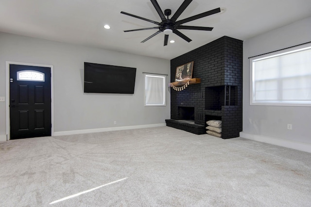 2525 New Hampshire Ave, Joplin, MO 64804 - unfurnished living room featuring carpet floors, a fireplace, recessed lighting, and ceiling fan