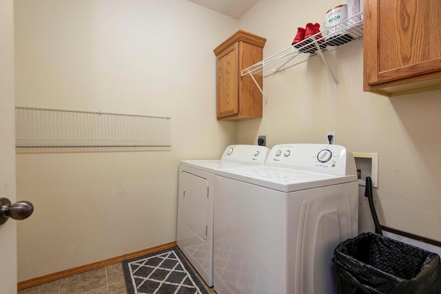 579 Lantern Hill Rd, Nixa, MO 65714 - laundry area featuring washing machine and clothes dryer and cabinet space