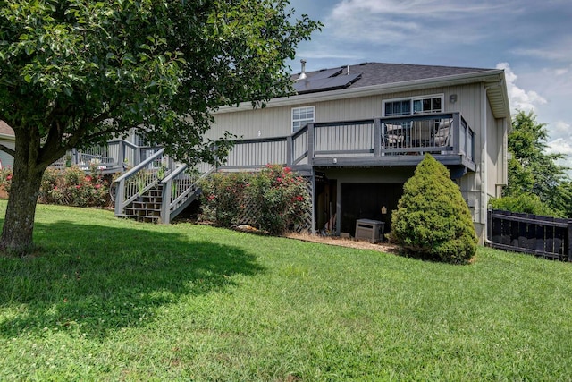 579 Lantern Hill Rd, Nixa, MO 65714 - back of house featuring a yard, a wooden deck, and stairway