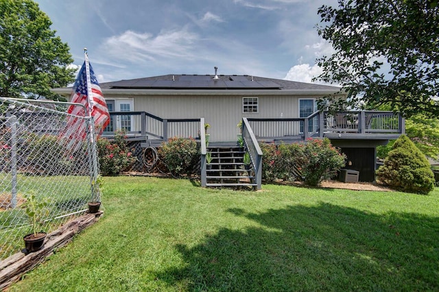 579 Lantern Hill Rd, Nixa, MO 65714 - rear view of property featuring stairway, solar panels, a yard, and a wooden deck
