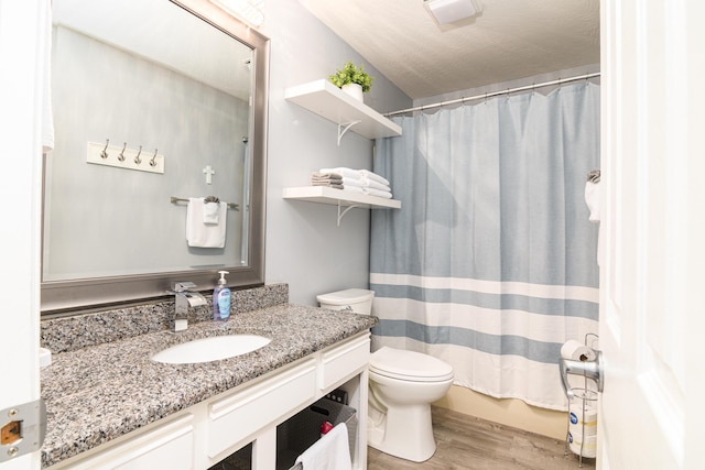 320 Turnberry Rd # 2, Branson, MO 65616 - full bath featuring wood finished floors, vanity, and a shower with curtain