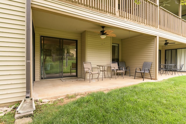 320 Turnberry Rd # 2, Branson, MO 65616 - patio / terrace with ceiling fan, a patio area, and a yard