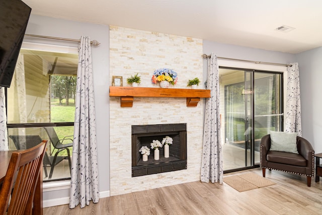 320 Turnberry Rd # 2, Branson, MO 65616 - living room featuring wood finished floors and a fireplace
