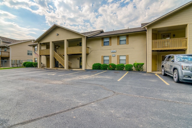 320 Turnberry Rd # 2, Branson, MO 65616 - view of building exterior featuring uncovered parking and stairs