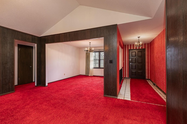 2311 E Meadow Dr, Springfield, MO 65804 - carpeted spare room featuring a chandelier and lofted ceiling