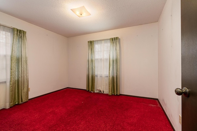 2311 E Meadow Dr, Springfield, MO 65804 - spare room featuring carpet floors and baseboards