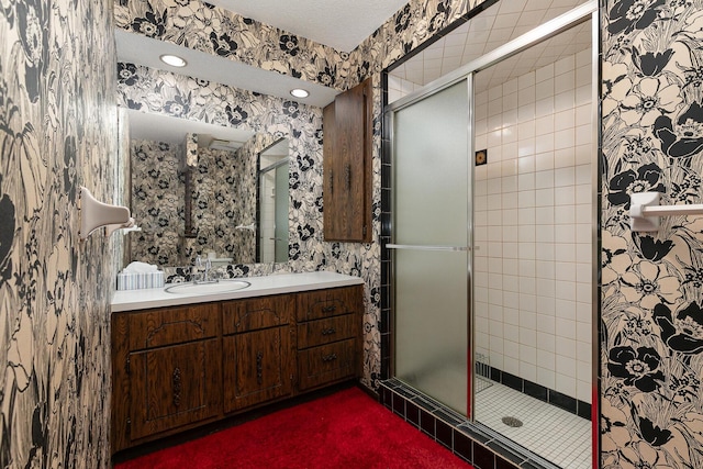 2311 E Meadow Dr, Springfield, MO 65804 - bathroom featuring a stall shower and vanity