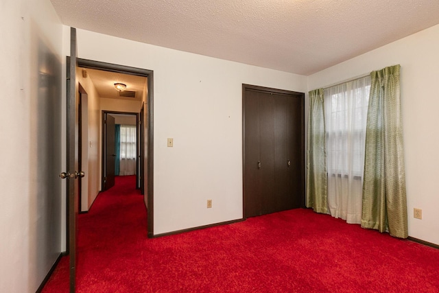 2311 E Meadow Dr, Springfield, MO 65804 - bedroom featuring dark carpet and a closet