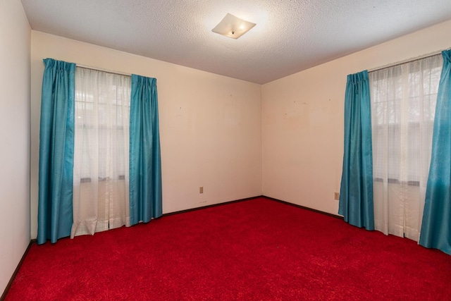 2311 E Meadow Dr, Springfield, MO 65804 - carpeted empty room featuring a textured ceiling