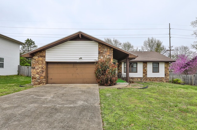 2311 E Meadow Dr, Springfield, MO 65804 - view of front of property with stone siding, concrete driveway, and a garage