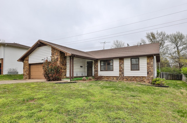 2311 E Meadow Dr, Springfield, MO 65804 - ranch-style home featuring stone siding, a garage, and driveway