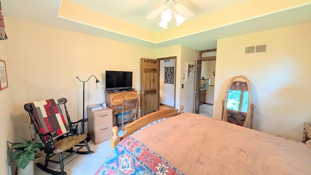 2930 S 175th Rd, El Dorado Springs, MO 64744 - bedroom featuring light carpet and a raised ceiling
