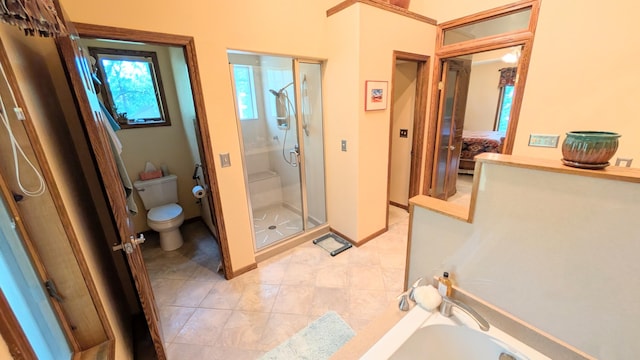 2930 S 175th Rd, El Dorado Springs, MO 64744 - ensuite bathroom with a shower stall, tile patterned flooring, and a bathtub