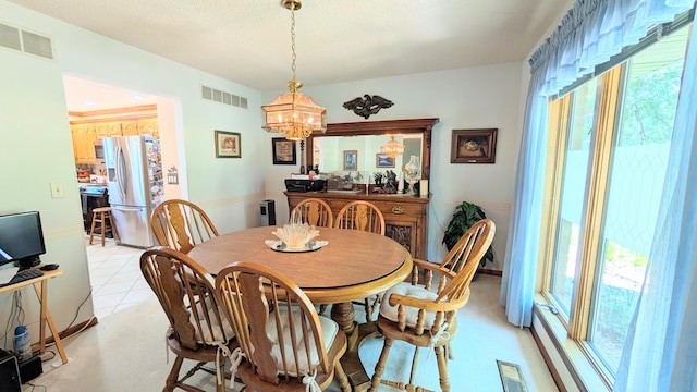 2930 S 175th Rd, El Dorado Springs, MO 64744 - dining area featuring a chandelier