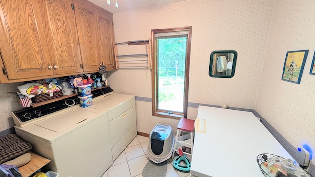 2930 S 175th Rd, El Dorado Springs, MO 64744 - laundry room with wallpapered walls, separate washer and dryer, cabinet space, and light tile patterned floors