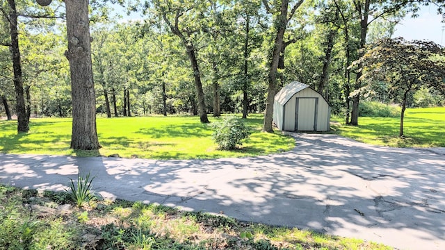 2930 S 175th Rd, El Dorado Springs, MO 64744 - view of patio / terrace with a storage shed