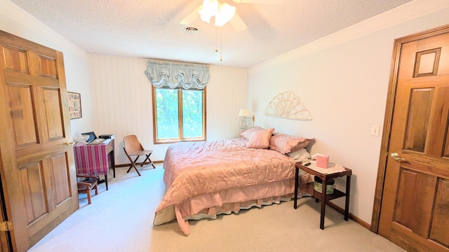 2930 S 175th Rd, El Dorado Springs, MO 64744 - bedroom with carpet floors, a textured ceiling, ceiling fan, and crown molding