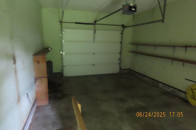 321 W Cofield St, Aurora, MO 65605 - garage with a garage door opener