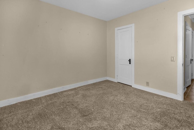 220 W Portland St, Springfield, MO 65807 - carpeted empty room featuring baseboards