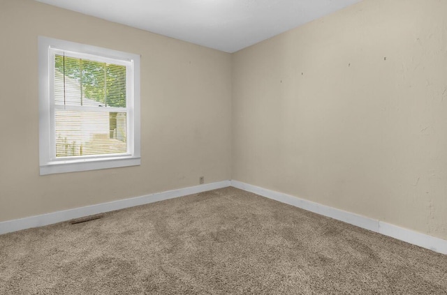 220 W Portland St, Springfield, MO 65807 - carpeted empty room with baseboards