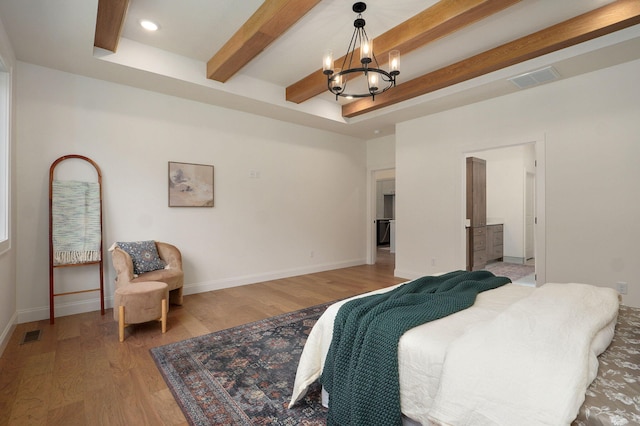 3945 E Woodhue St, Springfield, MO 65802 - bedroom with beam ceiling, a chandelier, light wood-style floors, and recessed lighting