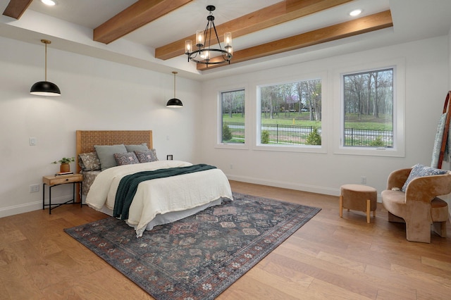 3945 E Woodhue St, Springfield, MO 65802 - bedroom with multiple windows, a chandelier, beamed ceiling, wood finished floors, and recessed lighting