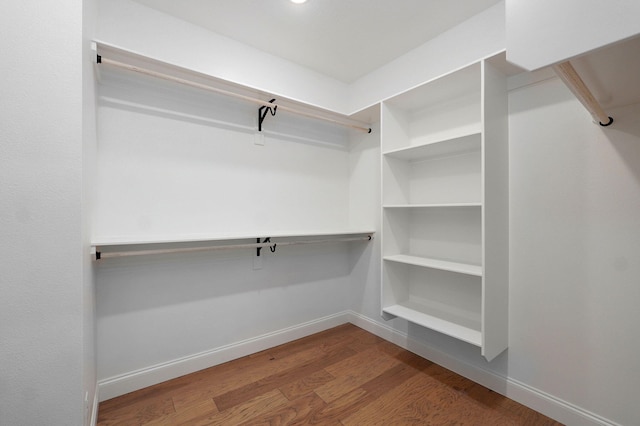 3945 E Woodhue St, Springfield, MO 65802 - spacious closet featuring wood finished floors