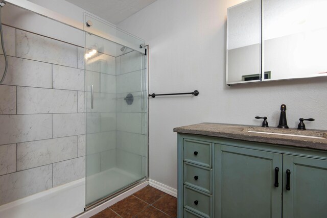 805 S Benson Pl, Nixa, MO 65714 - bathroom with a tile shower, vanity, and tile patterned floors