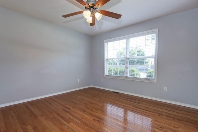 805 S Benson Pl, Nixa, MO 65714 - unfurnished room with wood finished floors and a ceiling fan