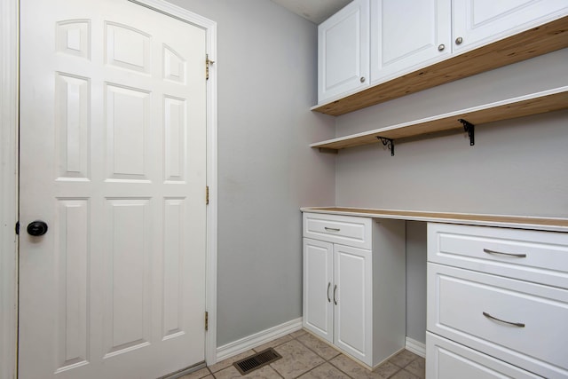 805 S Benson Pl, Nixa, MO 65714 - laundry area featuring baseboards and light tile patterned floors